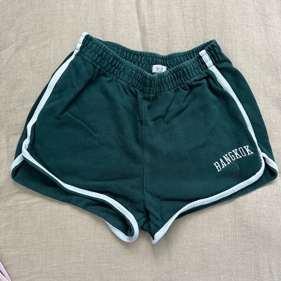 Brandy Melville Bangkok green dolphin shorts - Picture 1 of 4